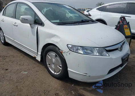2007 Honda Civic Hybrid from USA, damaged, VIN JHMFA36257S023594